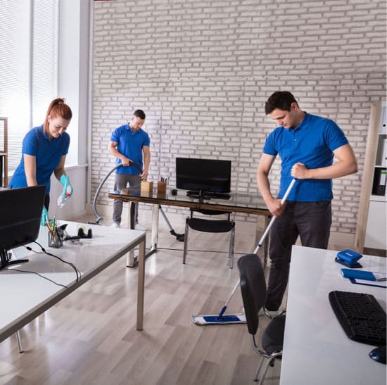 Janitorial service companies working on a commercial office cleaning job