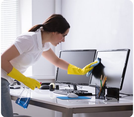 Commercial cleaning company cleaning laptops